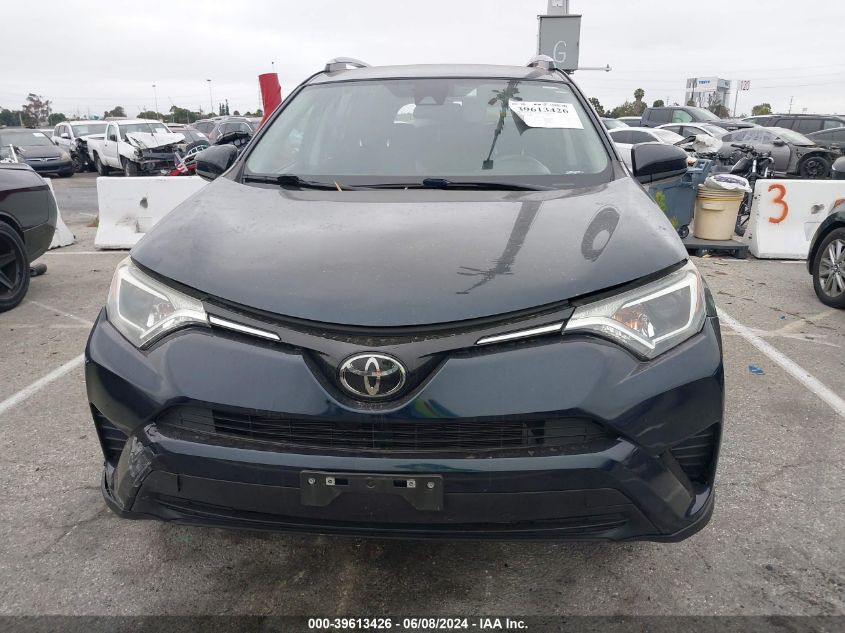 2018 Toyota Rav4 Le VIN: JTMBFREVXJJ245965 Lot: 39613426