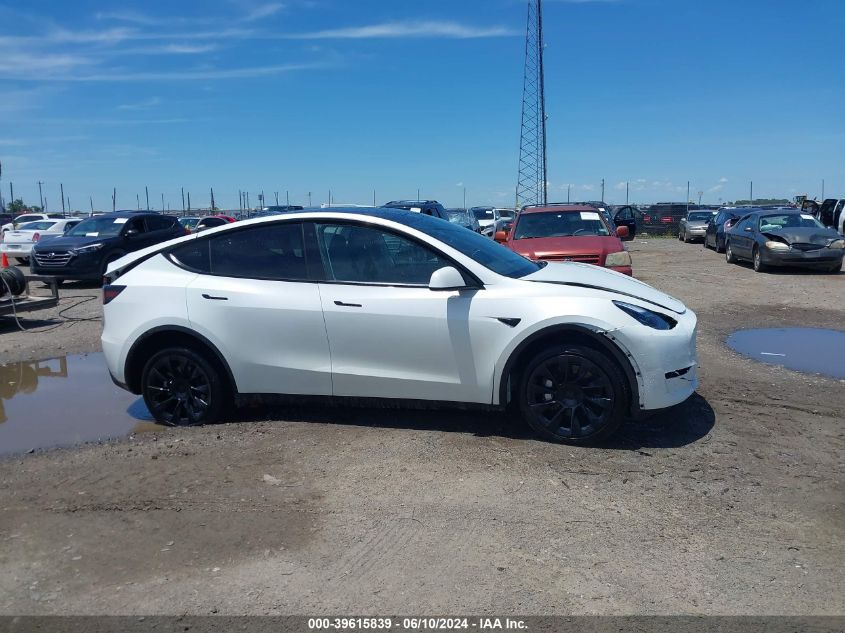 2023 Tesla Model Y Awd/Long Range Dual Motor All-Wheel Drive VIN: 7SAYGDEE9PF753051 Lot: 39615839