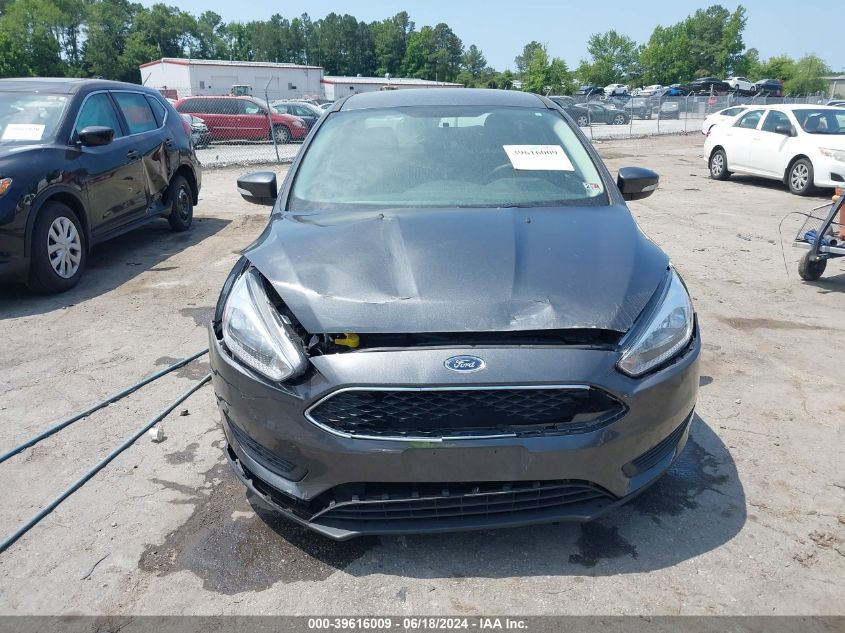 2017 Ford Focus Se VIN: 1FADP3F29HL300563 Lot: 39616009