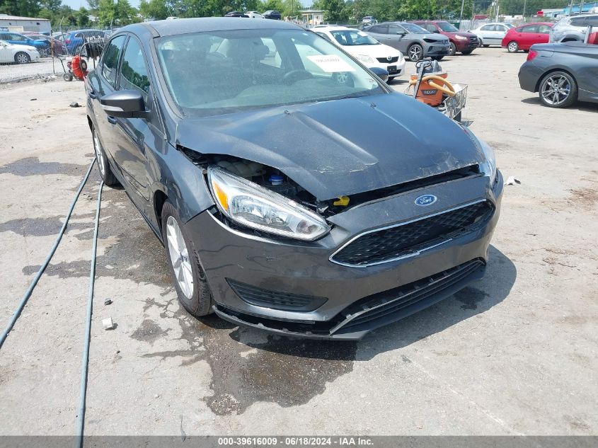 2017 Ford Focus Se VIN: 1FADP3F29HL300563 Lot: 39616009