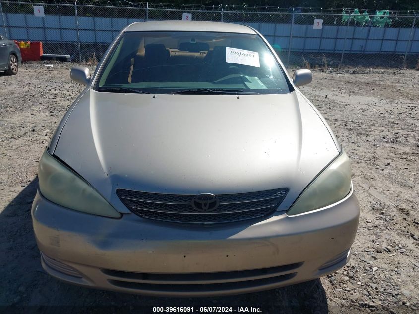 2003 Toyota Camry Le V6 VIN: 4T1BF32K93U565265 Lot: 39616091