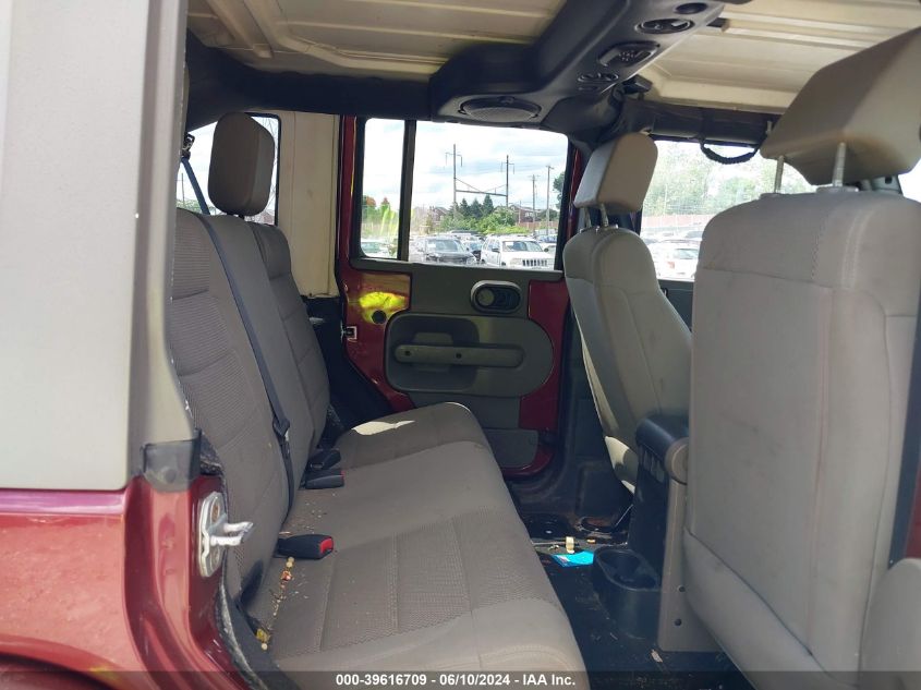 2007 Jeep Wrangler Unlimited Sahara VIN: 1J8GA59107L203119 Lot: 39616709