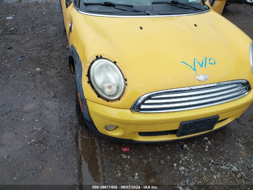 2007 Mini Cooper VIN: WMWMF33597TT50693 Lot: 39617400