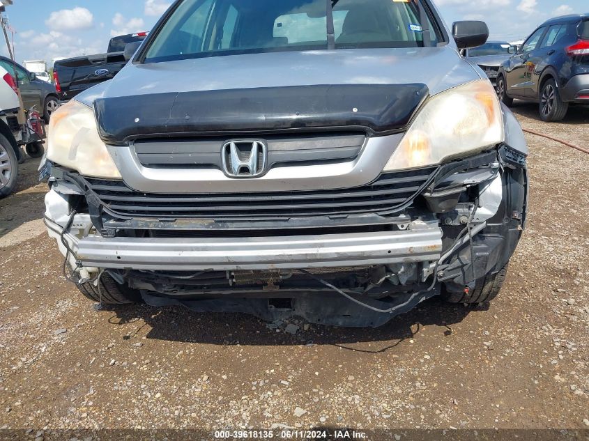 2009 Honda Cr-V Lx VIN: JHLRE38389C003266 Lot: 39618135