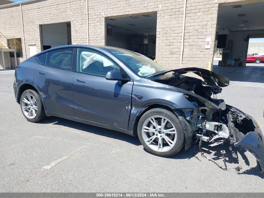 2023 Tesla Model Y Awd/Long Range Dual Motor All-Wheel Drive VIN: 7SAYGDEE5PF590947 Lot: 39618214