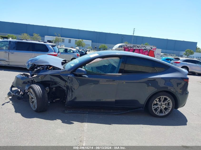 2023 Tesla Model Y Awd/Long Range Dual Motor All-Wheel Drive VIN: 7SAYGDEE5PF590947 Lot: 39618214