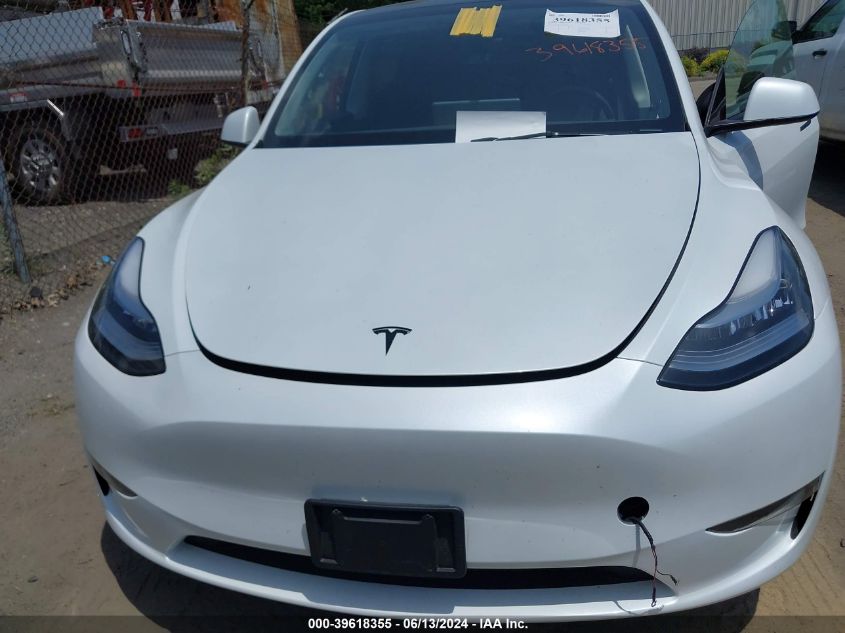 2023 Tesla Model Y Awd/Long Range Dual Motor All-Wheel Drive VIN: 7SAYGDEE5PA046607 Lot: 39618355