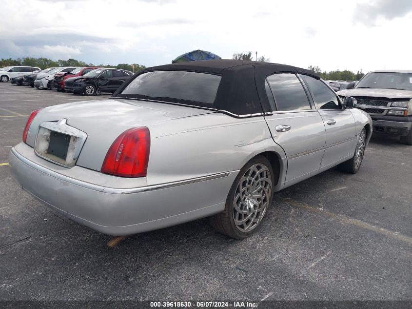 2000 Lincoln Town Car Executive VIN: 1LNHM81W2YY867305 Lot: 39618630