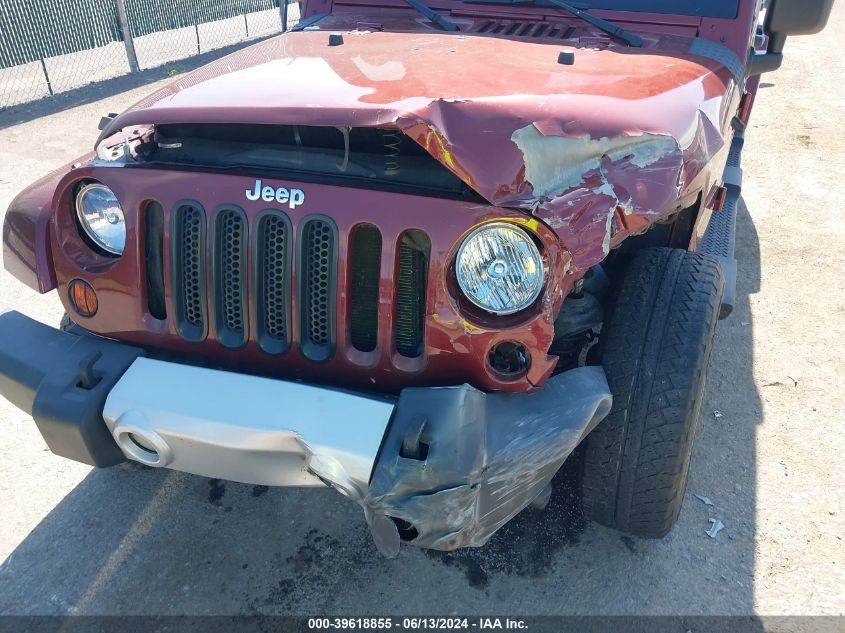 2009 Jeep Wrangler Unlimited Sahara VIN: 1J4GA59149L727345 Lot: 39618855