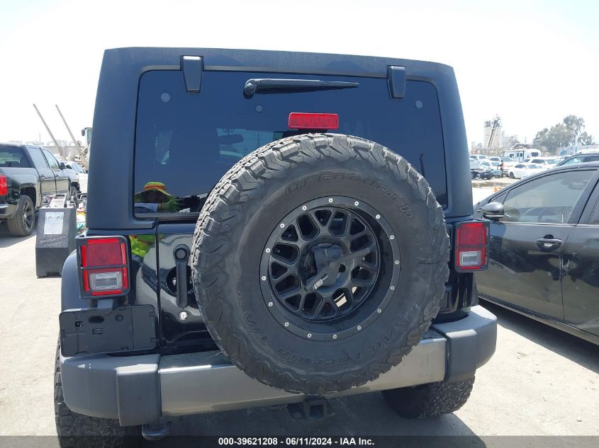 2014 Jeep Wrangler Unlimited Freedom Edition VIN: 1C4BJWDG8EL241617 Lot: 39621208