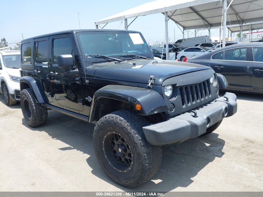 2014 Jeep Wrangler Unlimited Freedom Edition VIN: 1C4BJWDG8EL241617 Lot: 39621208