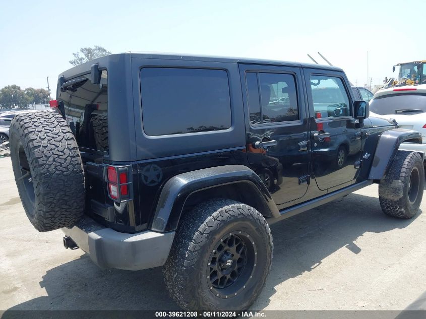 2014 Jeep Wrangler Unlimited Freedom Edition VIN: 1C4BJWDG8EL241617 Lot: 39621208