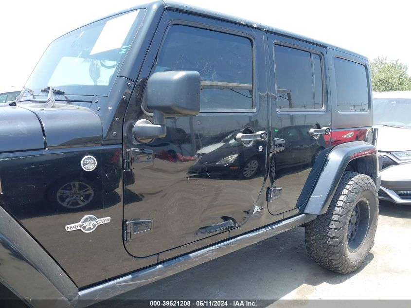 2014 Jeep Wrangler Unlimited Freedom Edition VIN: 1C4BJWDG8EL241617 Lot: 39621208