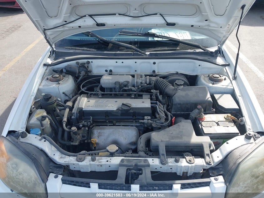 2005 Hyundai Accent Gl VIN: KMHCG45C65U630507 Lot: 39621583