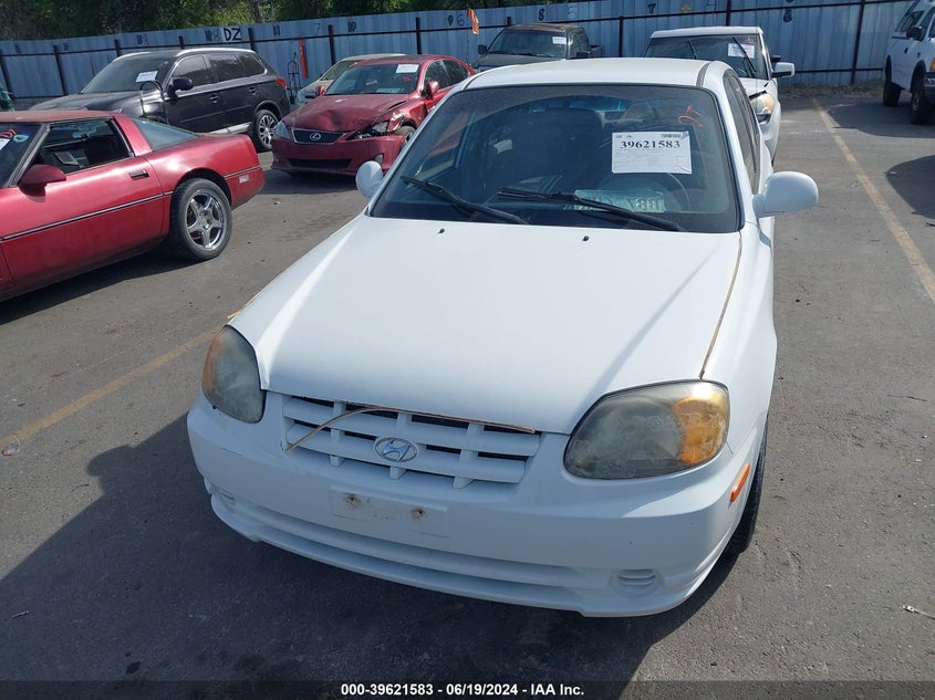 2005 Hyundai Accent Gl VIN: KMHCG45C65U630507 Lot: 39621583