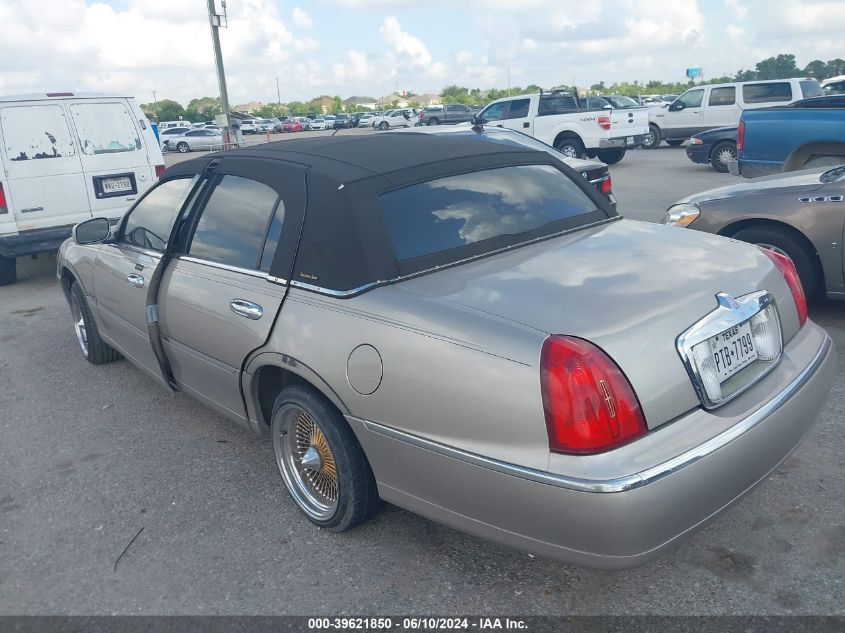 2000 Lincoln Town Car Executive VIN: 1LNHM81W1YY907518 Lot: 39621850