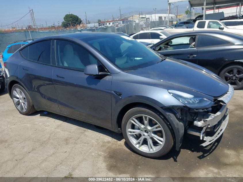 2023 Tesla Model Y Awd/Long Range Dual Motor All-Wheel Drive VIN: 7SAYGDEE7PA157112 Lot: 39622452