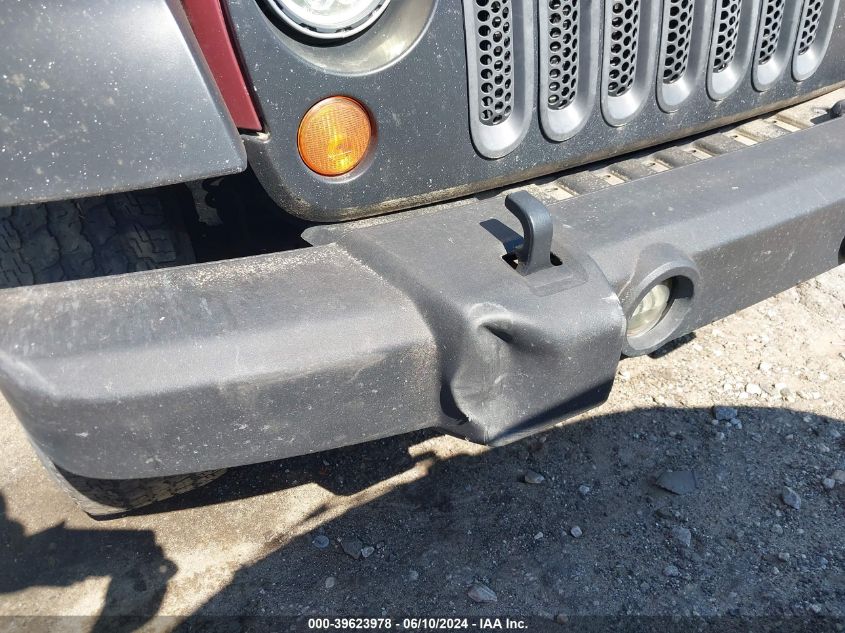 2007 Jeep Wrangler Unlimited Sahara VIN: 1J4GB59177L143029 Lot: 39623978