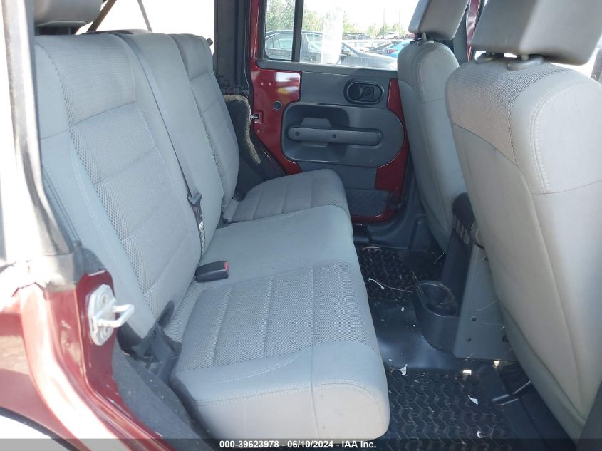 2007 Jeep Wrangler Unlimited Sahara VIN: 1J4GB59177L143029 Lot: 39623978