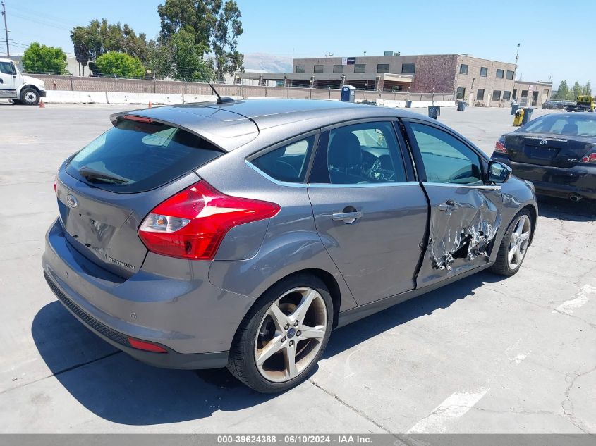 2014 Ford Focus Titanium VIN: 1FADP3N27EL199410 Lot: 39624388