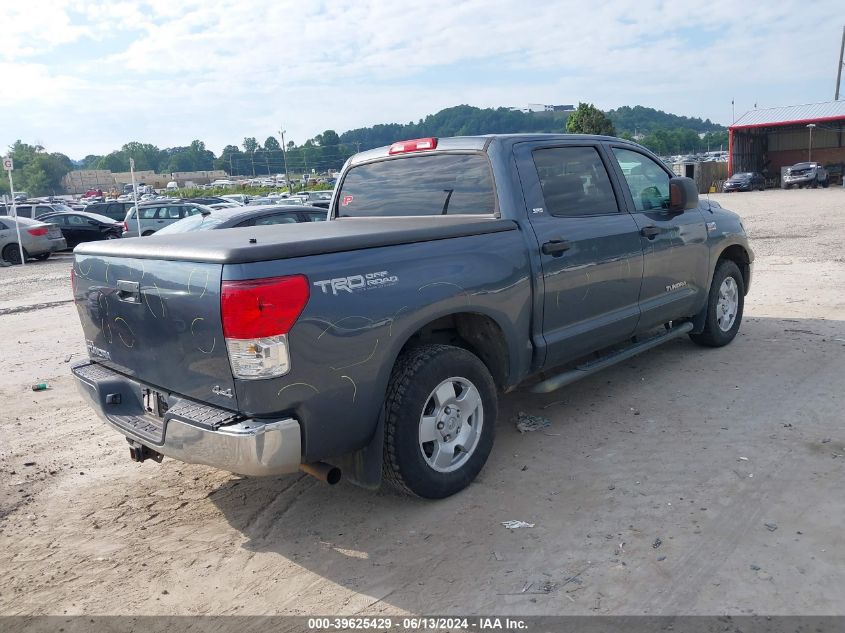 2010 Toyota Tundra Grade 5.7L V8 VIN: 5TFDY5F16AX123818 Lot: 39625429