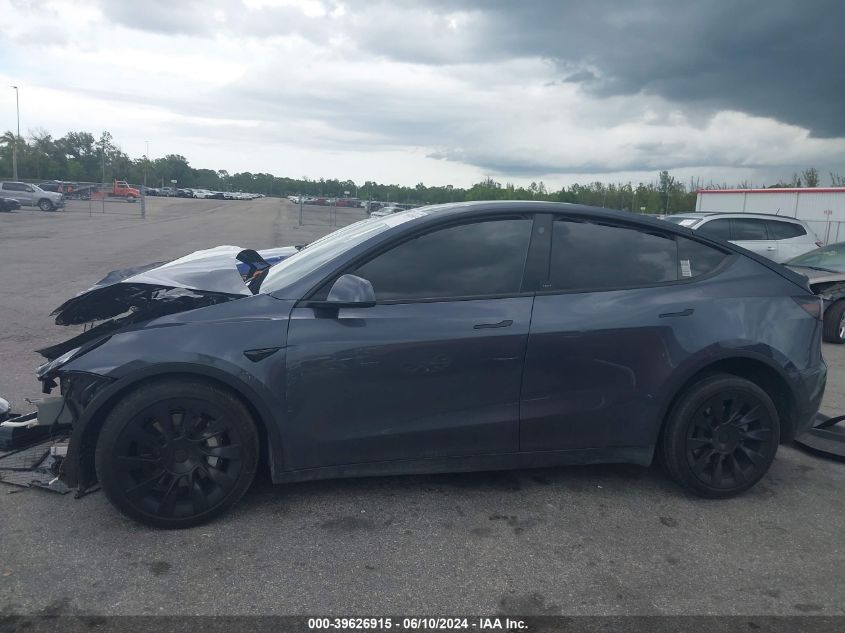 2023 Tesla Model Y Awd/Long Range Dual Motor All-Wheel Drive VIN: 7SAYGAEE8PF708097 Lot: 39626915