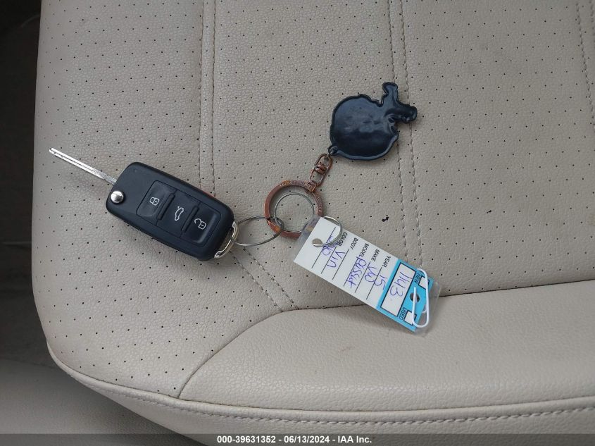 2015 Volkswagen Passat 1.8T Limited Edition VIN: 1VWAT7A35FC113010 Lot: 39631352