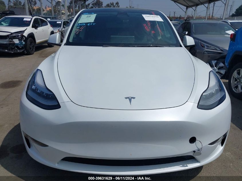 2023 Tesla Model Y Awd/Long Range Dual Motor All-Wheel Drive VIN: 7SAYGDEE6PA093015 Lot: 39631629