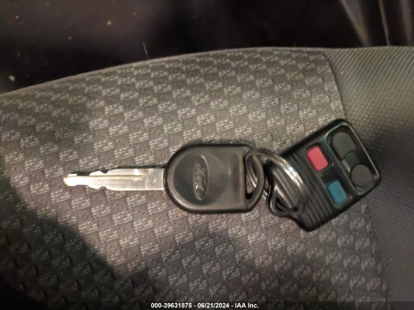 2006 Ford Focus Zx5 VIN: 1FAFP37N06W141784 Lot: 39631875