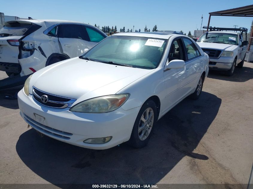 2004 Toyota Camry Le VIN: JTDBE30K240256384 Lot: 39632129