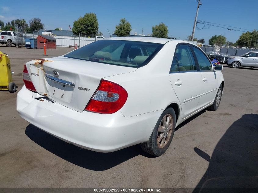 2004 Toyota Camry Le VIN: JTDBE30K240256384 Lot: 39632129