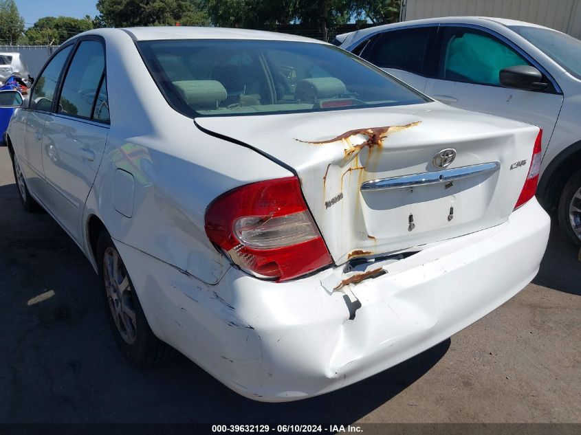 2004 Toyota Camry Le VIN: JTDBE30K240256384 Lot: 39632129