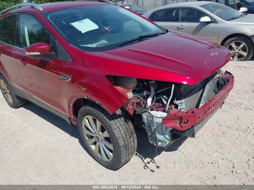 2017 Ford Escape Titanium VIN: 1FMCU9J94HUE69319 Lot: 39632616