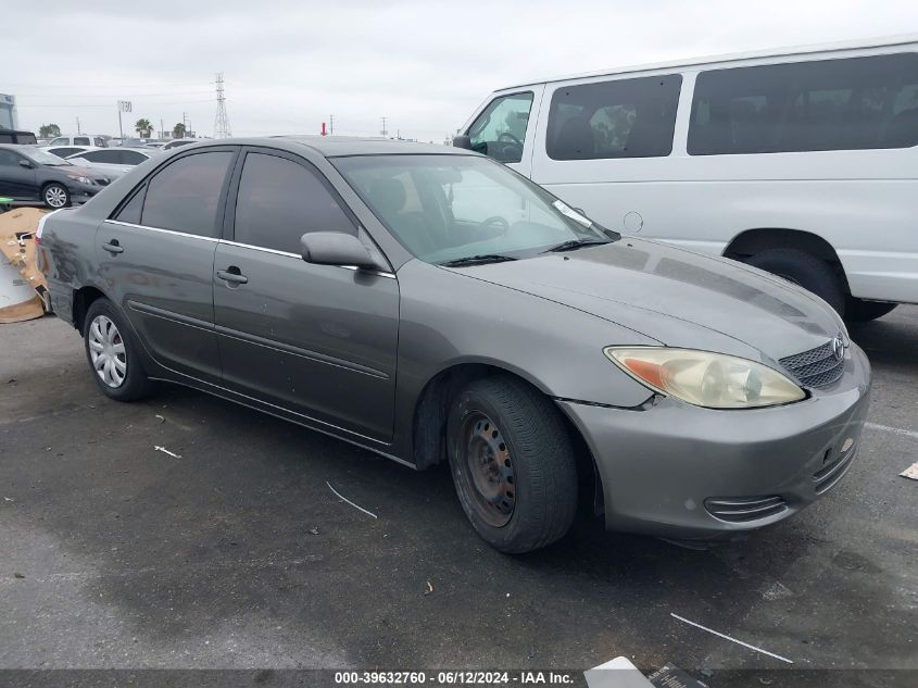 2003 Toyota Camry Le VIN: JTDBE32K930183560 Lot: 39632760