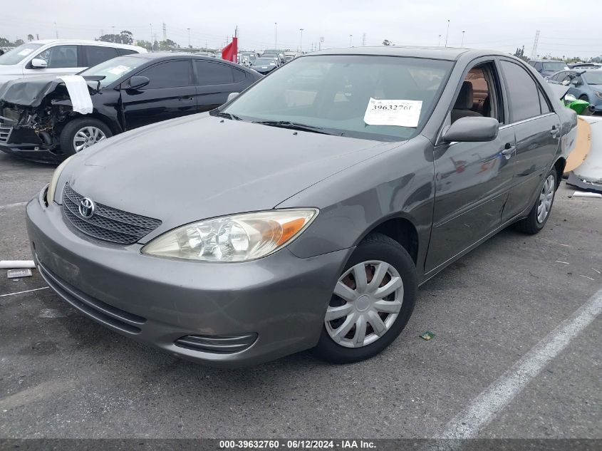 2003 Toyota Camry Le VIN: JTDBE32K930183560 Lot: 39632760