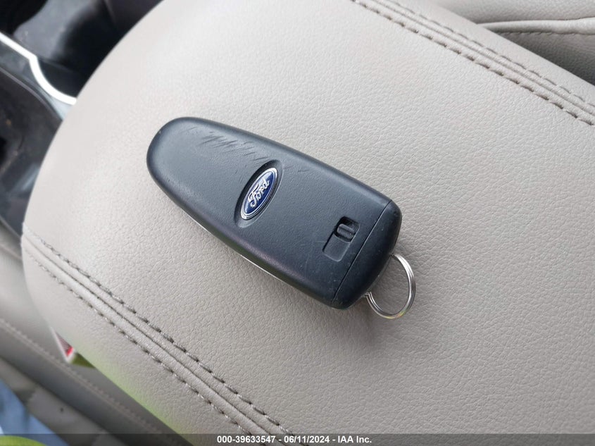 2015 Ford Escape Titanium VIN: 1FMCU0J97FUA51572 Lot: 39633547