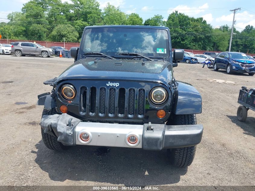 2008 Jeep Wrangler Unlimited Sahara VIN: 1J4GA59148L566994 Lot: 39633565