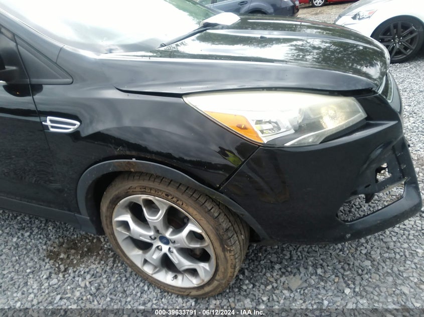 2014 Ford Escape Titanium VIN: 1FMCU0J9XEUA94575 Lot: 39633791