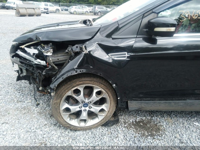 2014 Ford Escape Titanium VIN: 1FMCU0J9XEUA94575 Lot: 39633791