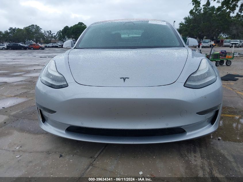 2018 Tesla Model 3 Long Range/Mid Range VIN: 5YJ3E1EA7JF060799 Lot: 39634341