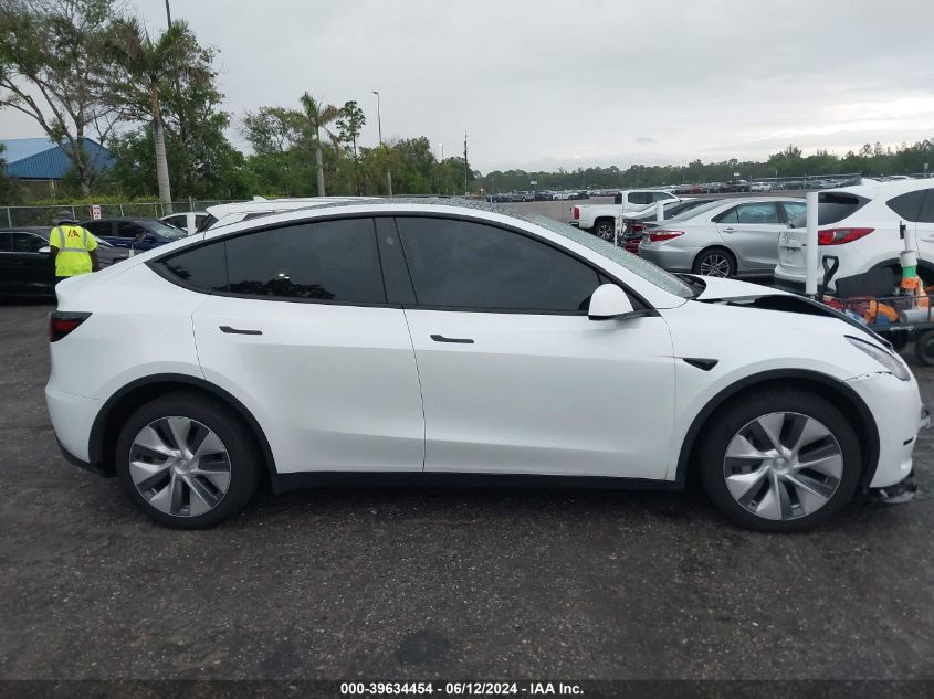 2023 Tesla Model Y Awd/Long Range Dual Motor All-Wheel Drive VIN: 7SAYGDEE6PA195009 Lot: 39634454