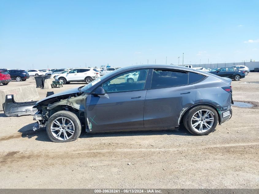 2023 Tesla Model Y Awd/Long Range Dual Motor All-Wheel Drive VIN: 7SAYGDEEXPA211406 Lot: 39635241