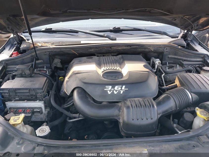 2012 Jeep Grand Cherokee Laredo VIN: 1C4RJEAG1CC210221 Lot: 39636602