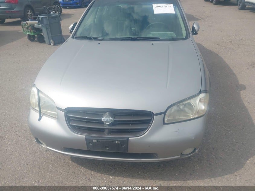 2000 Nissan Maxima Gle/Gxe/Se VIN: JN1CA31A5YT006909 Lot: 39637574