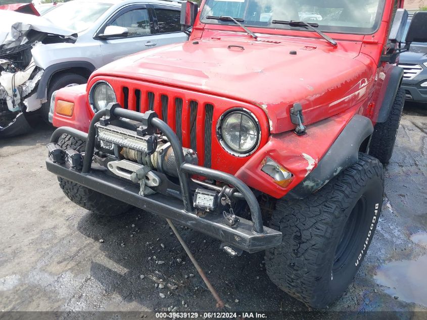 1999 Jeep Wrangler Sport VIN: 1J4FY19S6XP455833 Lot: 39639129