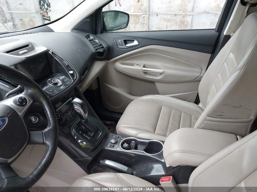 2016 Ford Escape Titanium VIN: 1FMCU0JX9GUC24928 Lot: 39639241