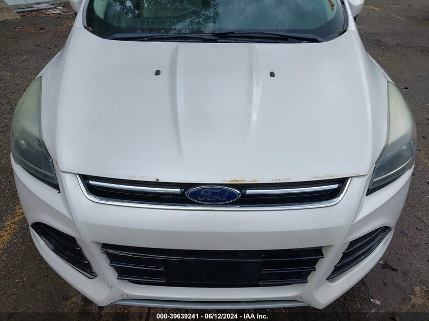 2016 Ford Escape Titanium VIN: 1FMCU0JX9GUC24928 Lot: 39639241