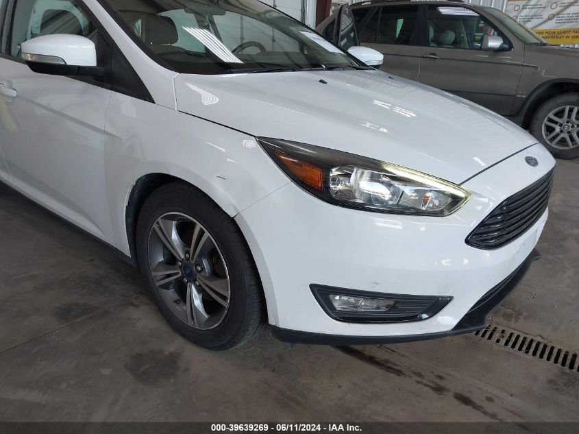 2017 Ford Focus Se VIN: 1FADP3FE8HL284673 Lot: 39639269