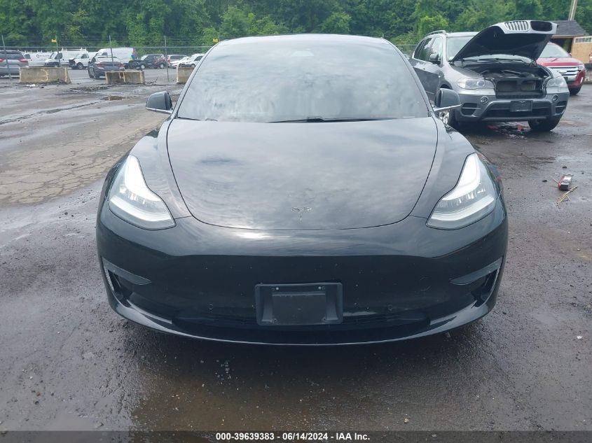 2018 Tesla Model 3 Long Range/Performance VIN: 5YJ3E1EB5JF113394 Lot: 39639383