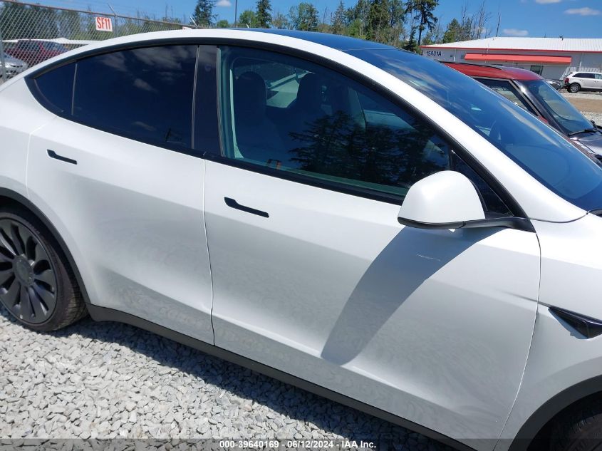 2023 Tesla Model Y Awd/Performance Dual Motor All-Wheel Drive VIN: 7SAYGDEF8PF663950 Lot: 39640169